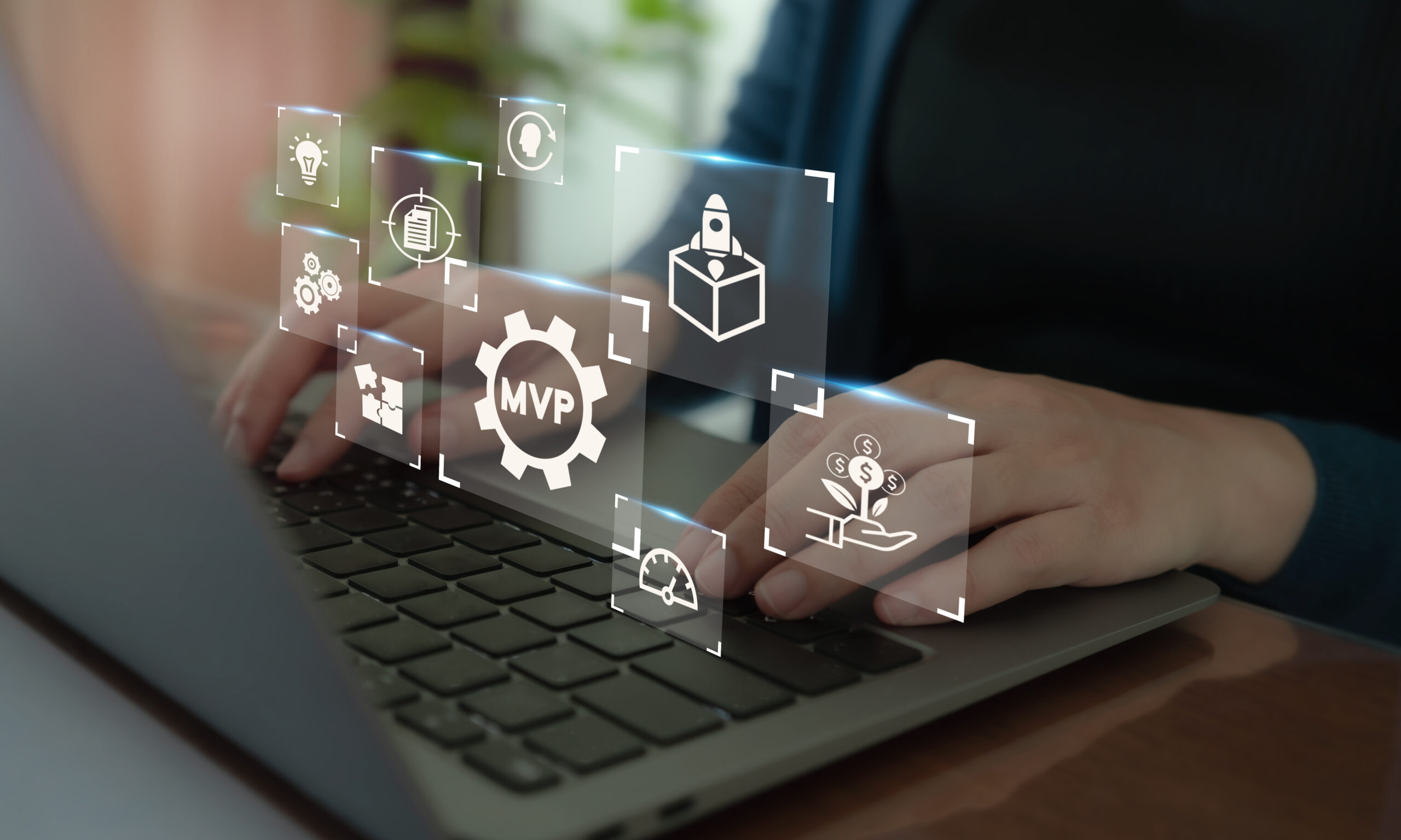 MVP, minimum viable product concept for lean startup. New product release planning. Analysis and market validation. Working on computer with MVP and learn, build, measure icons on smart background.